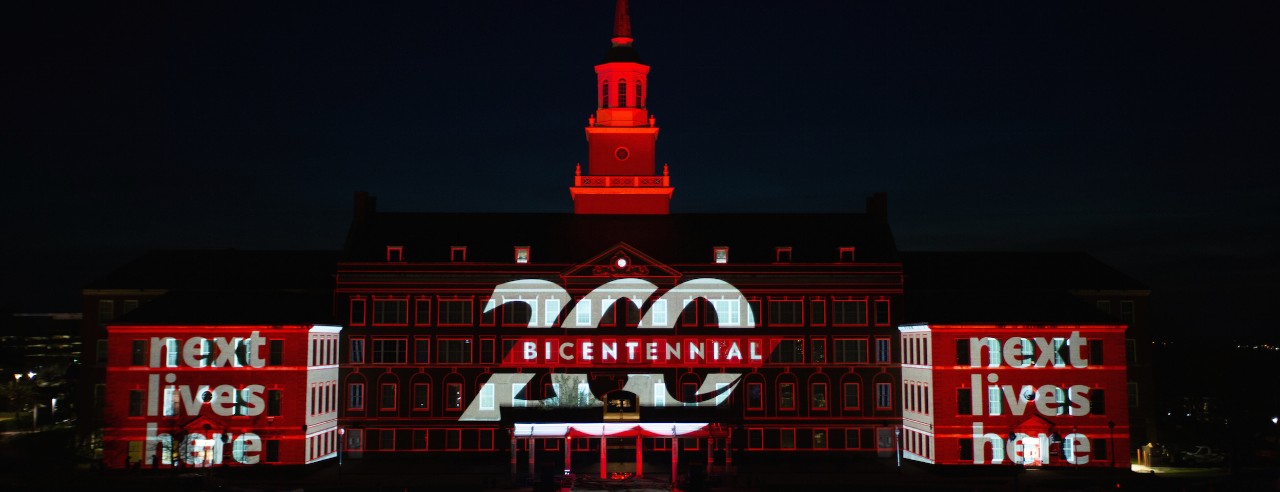 University of Cincinnati 200 Bicentennial and Next Lives Here displayed on McMicken Hall during Community Day to celebrate UC's Bicentennial Saturday April 6, 2019 at McMicken Commons on the campus of the University of Cincinnati. Photo by Andrew Higley/University of Cincinnati
