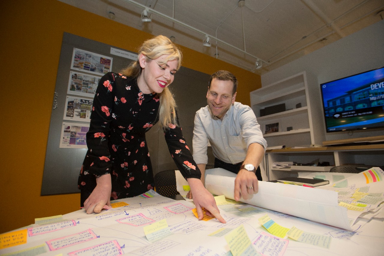 UC co-op student Christine Tweddell at work with architect and strategist Drew Suszko at BHDP.