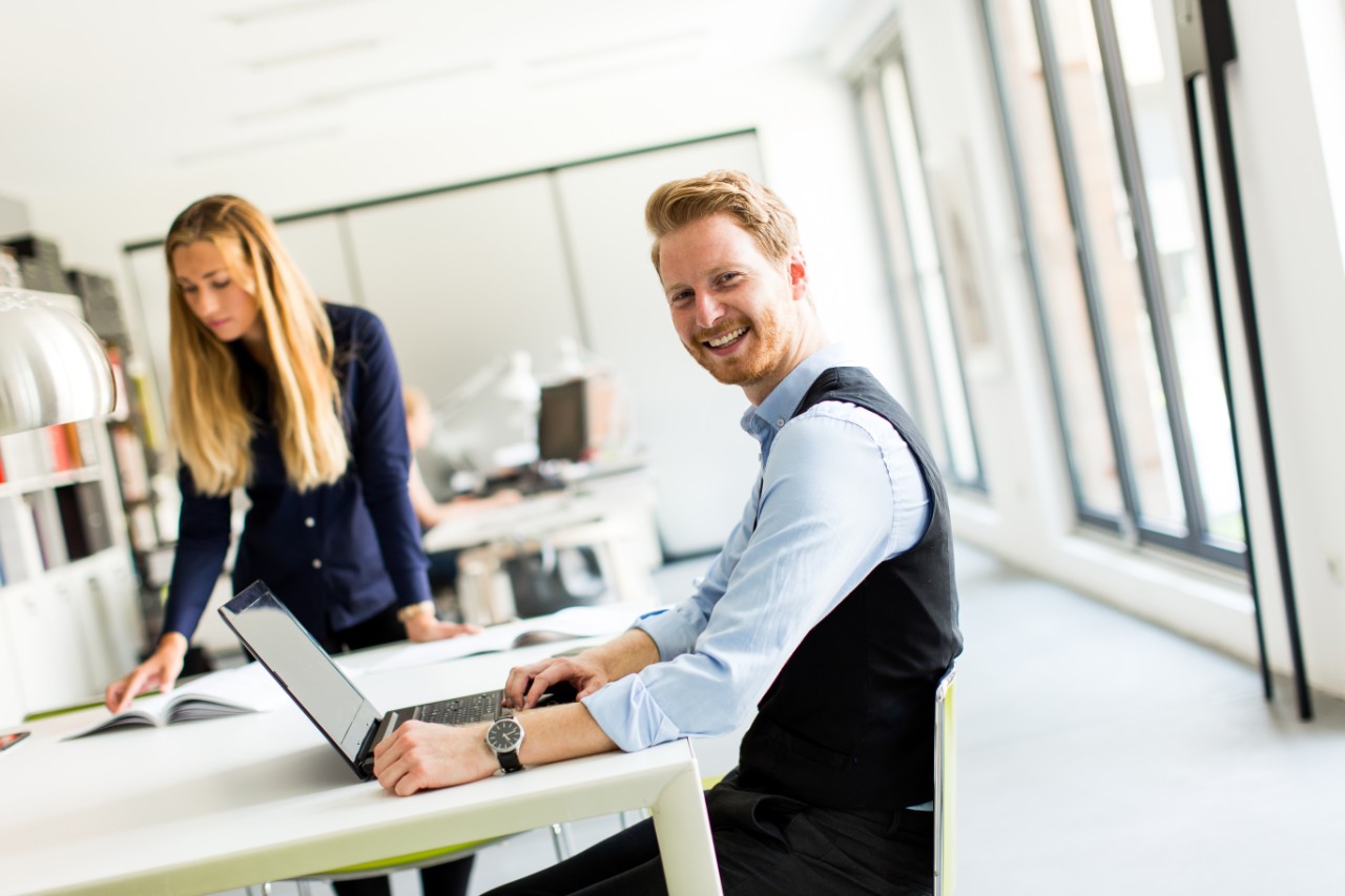 Young business people are in the office and working together