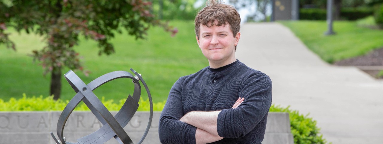 Jacob Todd, UC physics student honored by Fermilab for the best master's thesis shown here outside of the Geo-Phys. UC/ Joseph Fuqua II