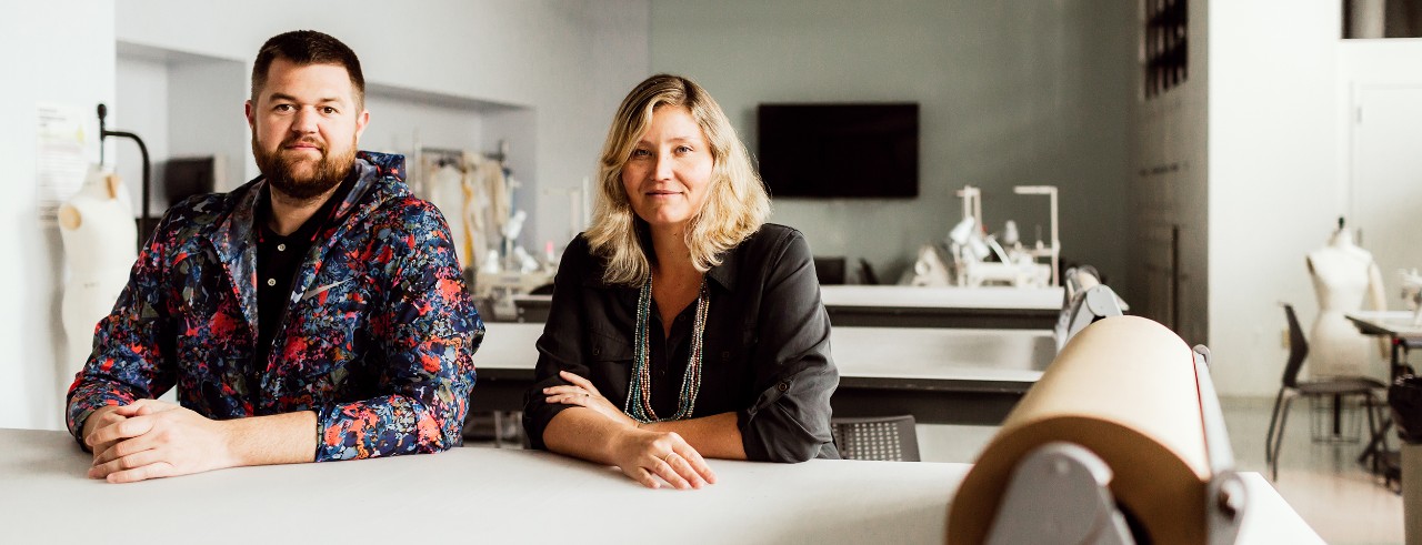 two design teachers in a sewing lab