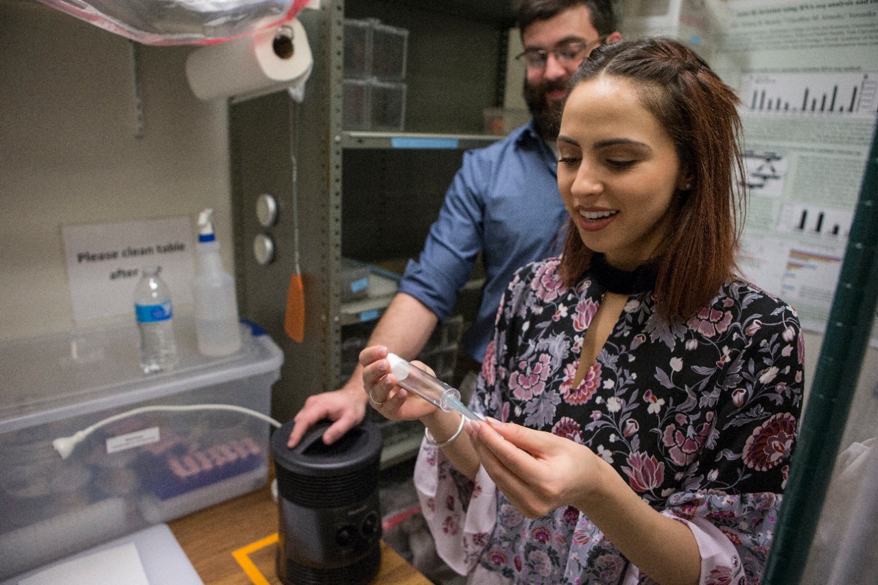 Dr. Joshua Benoit leads a team of researchers studying mosquitoes. Student Gabriela Nine