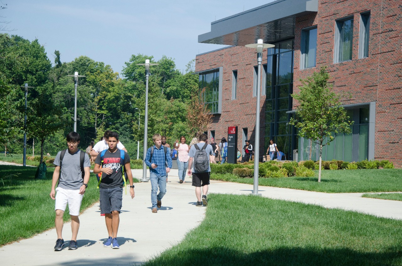 Students walking outside Progress Hall at UC Blue Ash