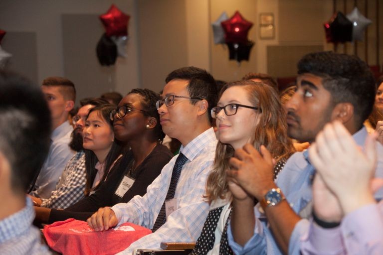 Incoming medical students are shown in Kresge Auditorium.