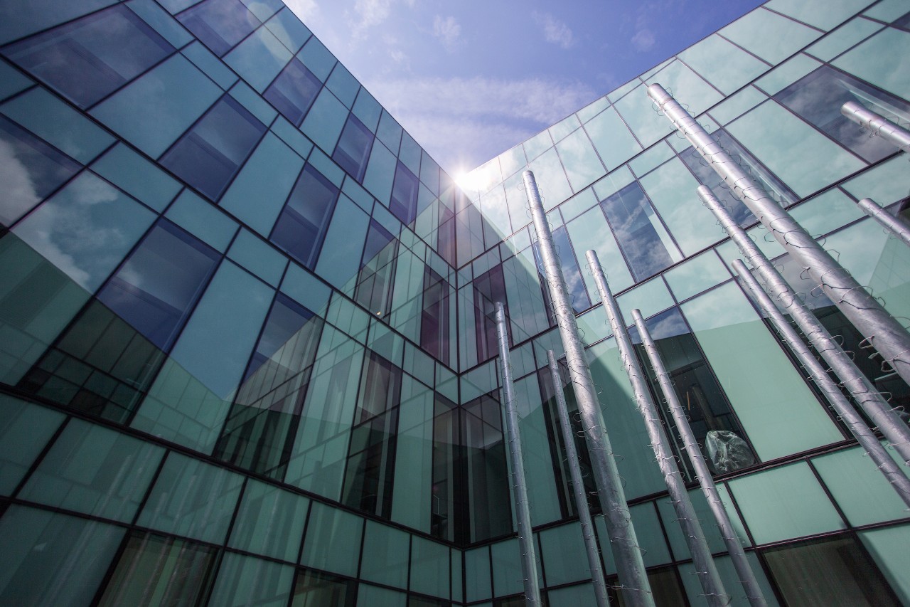 The rectangular windows of Lindner Hall, viewed from inside one of the building's interior courtyards.