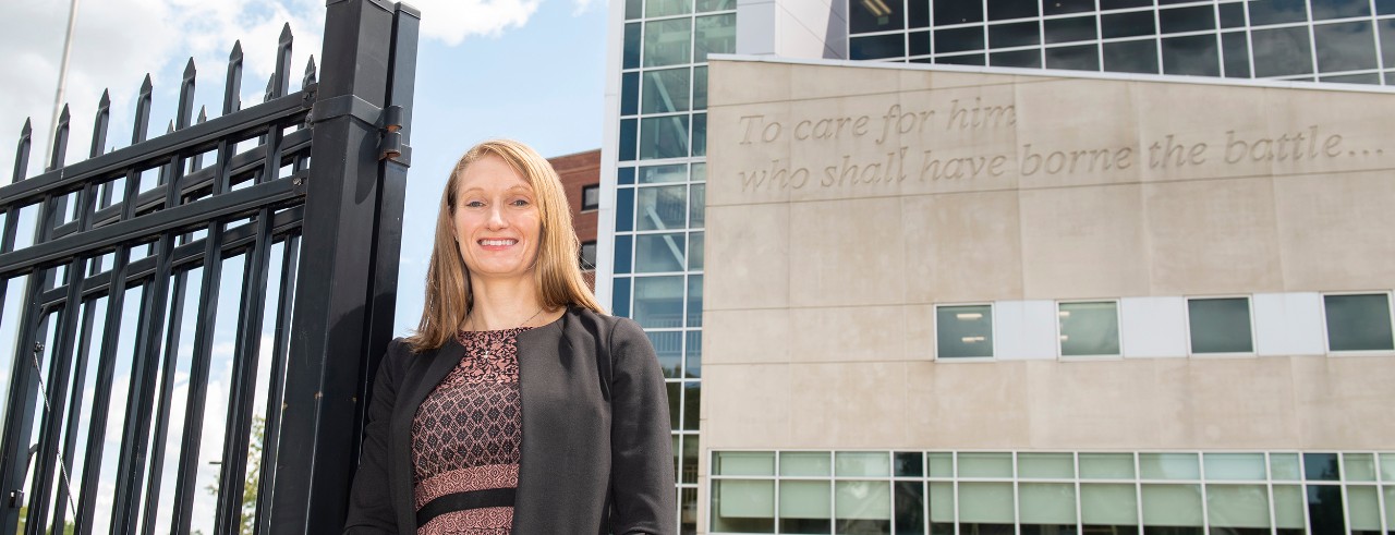 Pharmacist Tina Hamilton, PharmD, standing outside of the Cincinnati Veterans Affairs Center