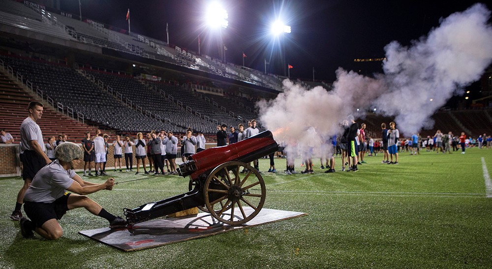 ROTC students fire a cannon to signal the start of the 9/11 Stair Run