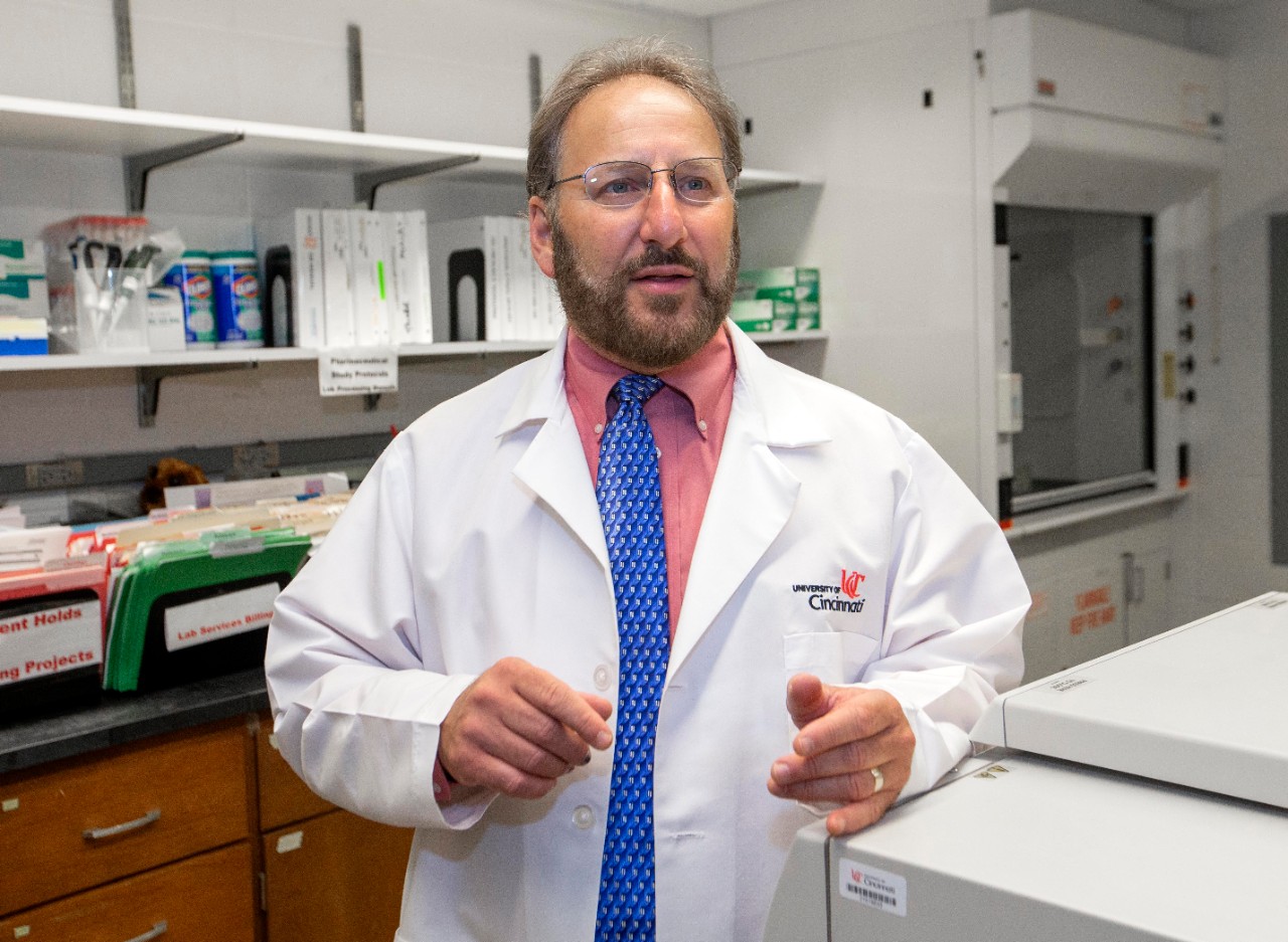 Dr. Carl Fichtenbaum working in a lab in the Medical Sciences Building