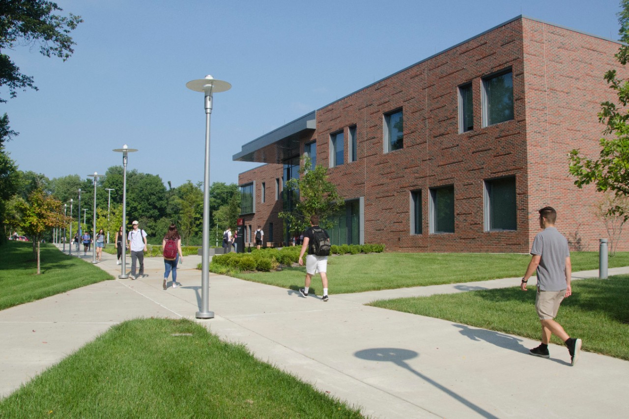 Students walking outside Progress Hall at UC Blue Ash