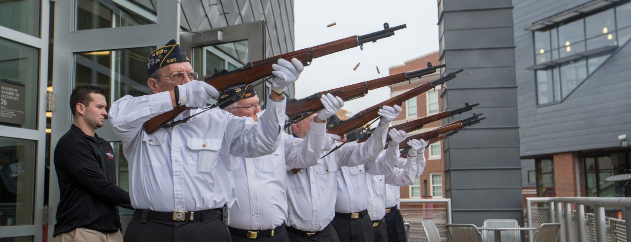 Veterans fire rifles from the balcony of Tangeman University Center on the campus of the University of Cincinnati