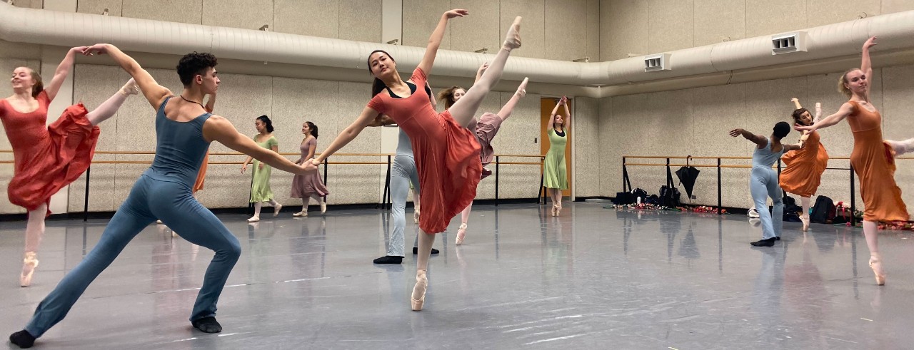 Student dancers rehearsing in a practice room for The Art of Motion