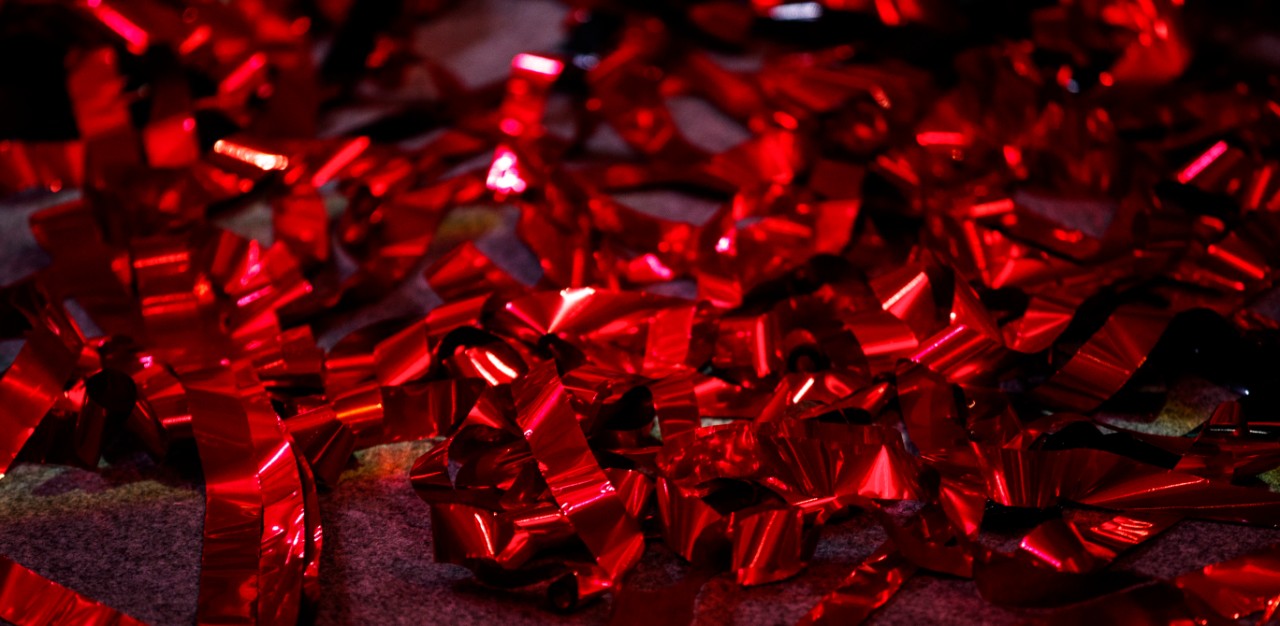 fallen red confetti on the ground