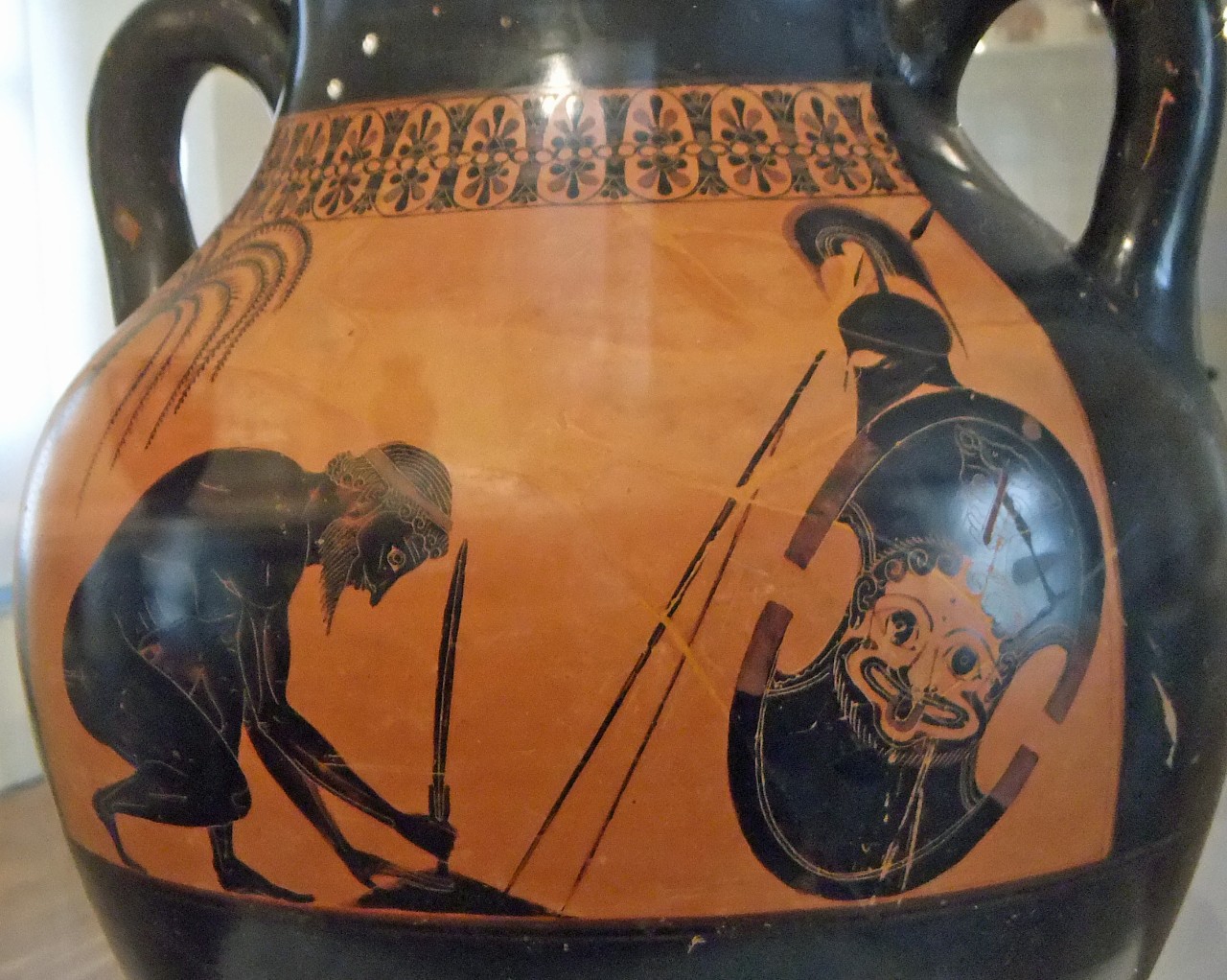 An ancient Greek vase by the artist Exekias depicts the suicide of Ajax after the Trojan War.