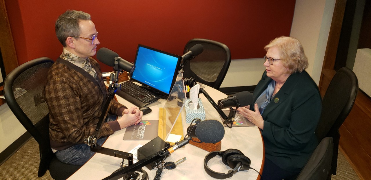 Susan Pinney, PhD, shown with radio broadcaster during interview.