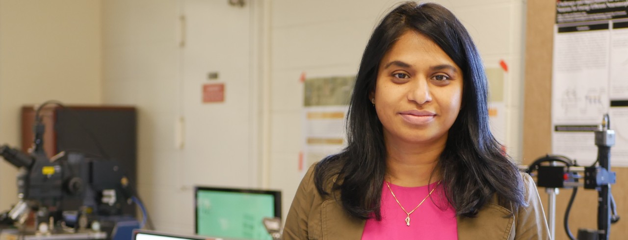 Rashmi Jha poses in her lab.