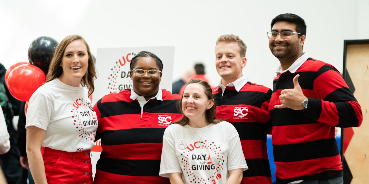 Students pose at a UC Day of Giving event