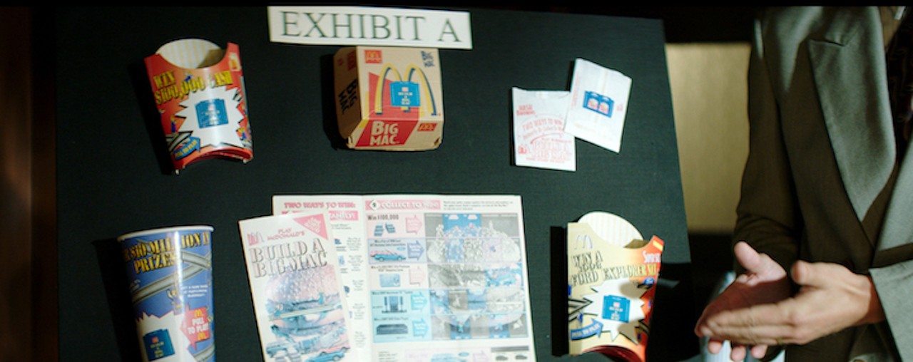 McDonald's monopoly pieces displayed on an evidence board