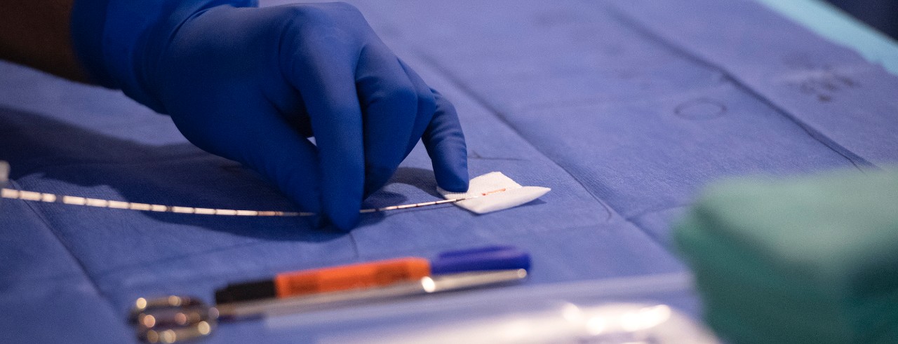 Close-up of a doctor performing a prostate cancer biopsy 