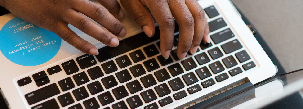 Hands on a computer keyboard