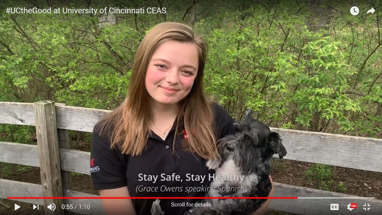 UC student Grace Owens holder her dog