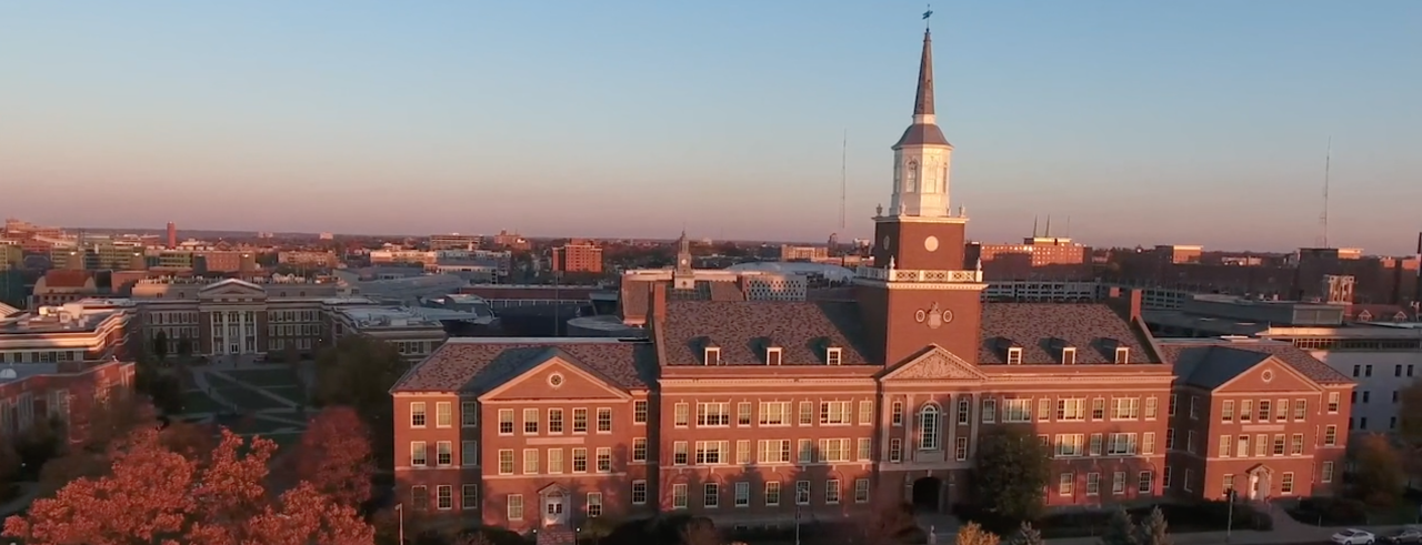 aerial view of McMicken Hall at sunset