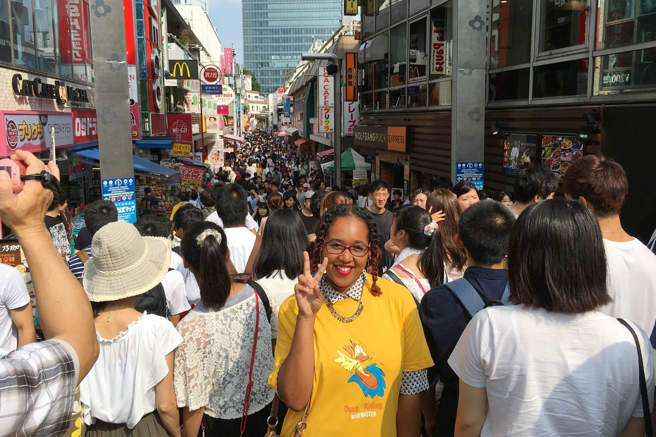 Kalea Lucas poses on a busy street in Seoul, South Korea.