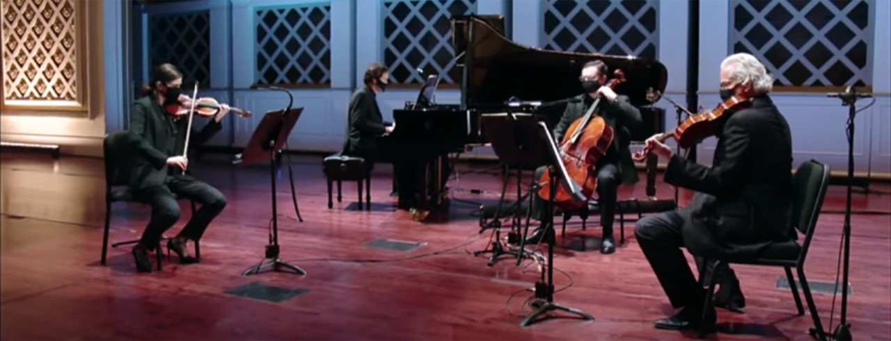 Four CSO musicians on stage at Music Hall