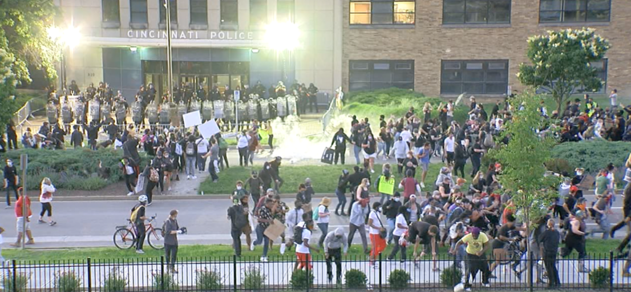 A large group of protesters outside of Cincinnati Police District One headquarters