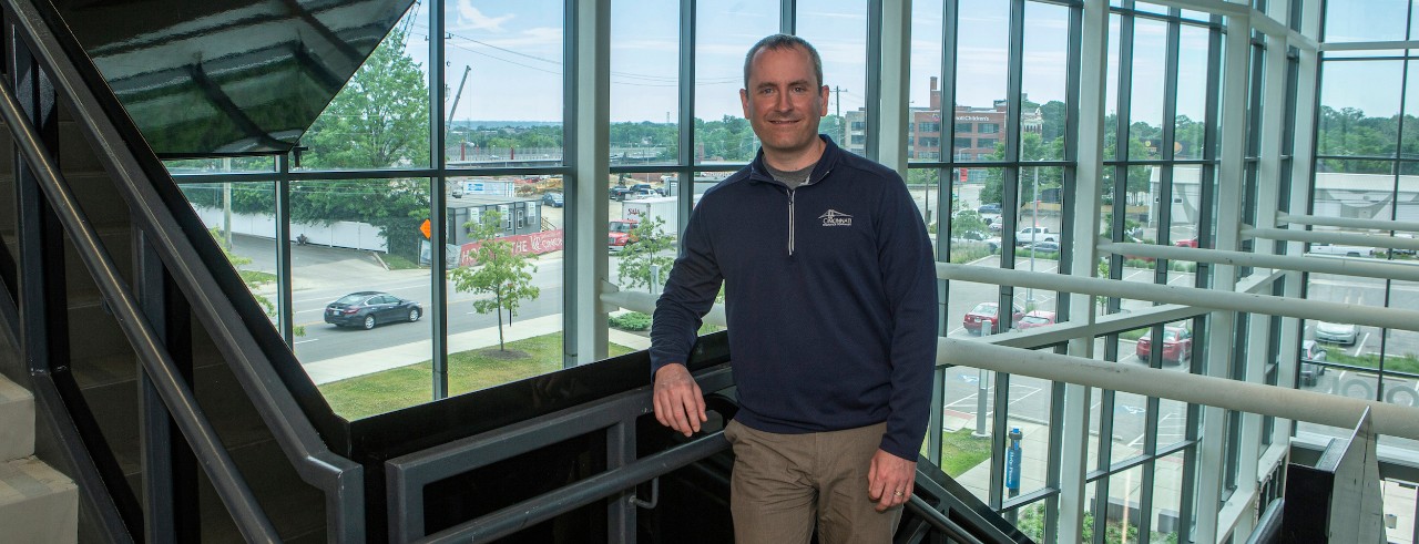 Danny Hayes stands insides UC's 1819 Innovation Hub