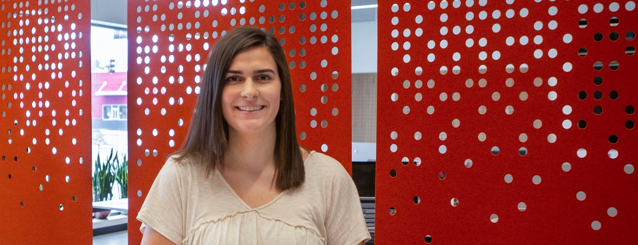 Abby McInturf portrait taken inside Venture Lab office at 1819 Innovation Hub