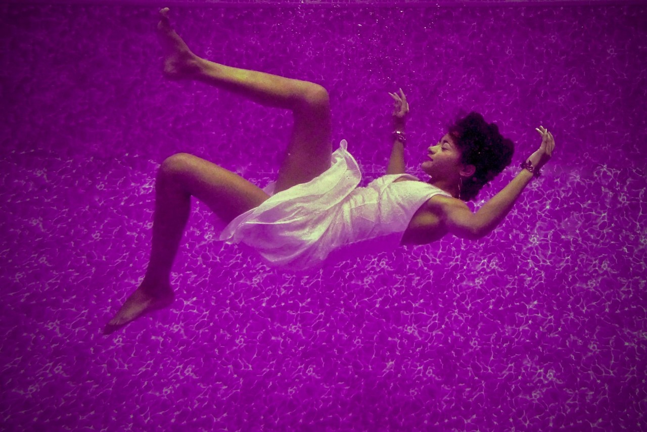woman floating in water dream image