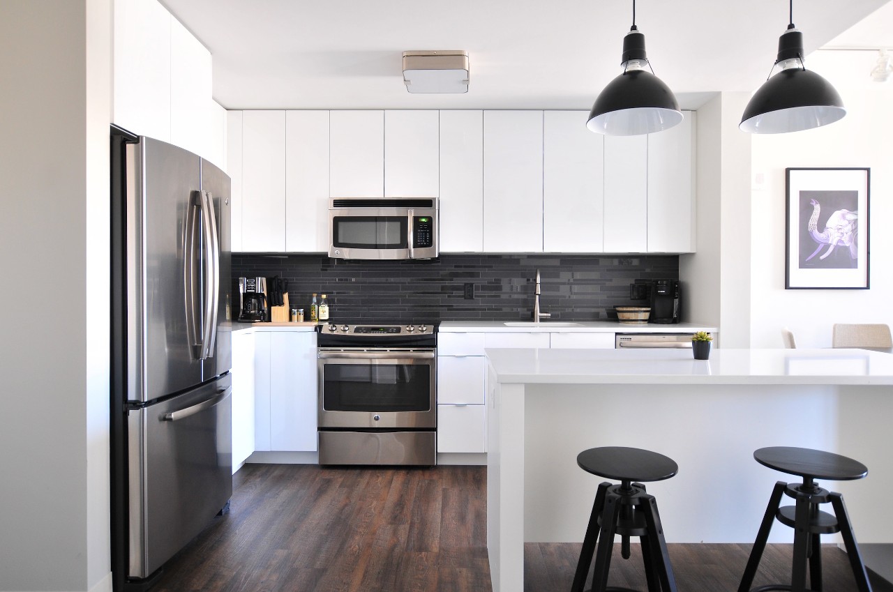 A kitchen with modern stainless steel appliances