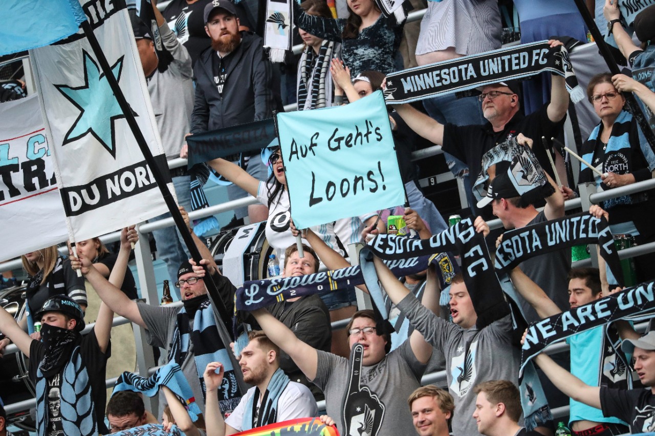 Fans cheering at a Minnesota United game