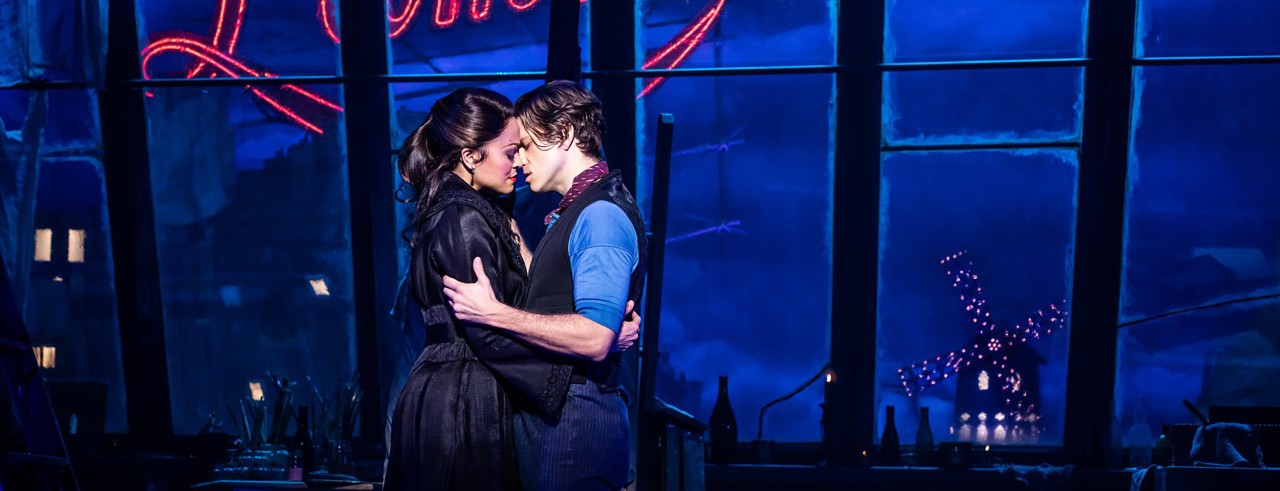 Karen Olivo and Aaron Tveit on stage during a Moulin Rouge performance