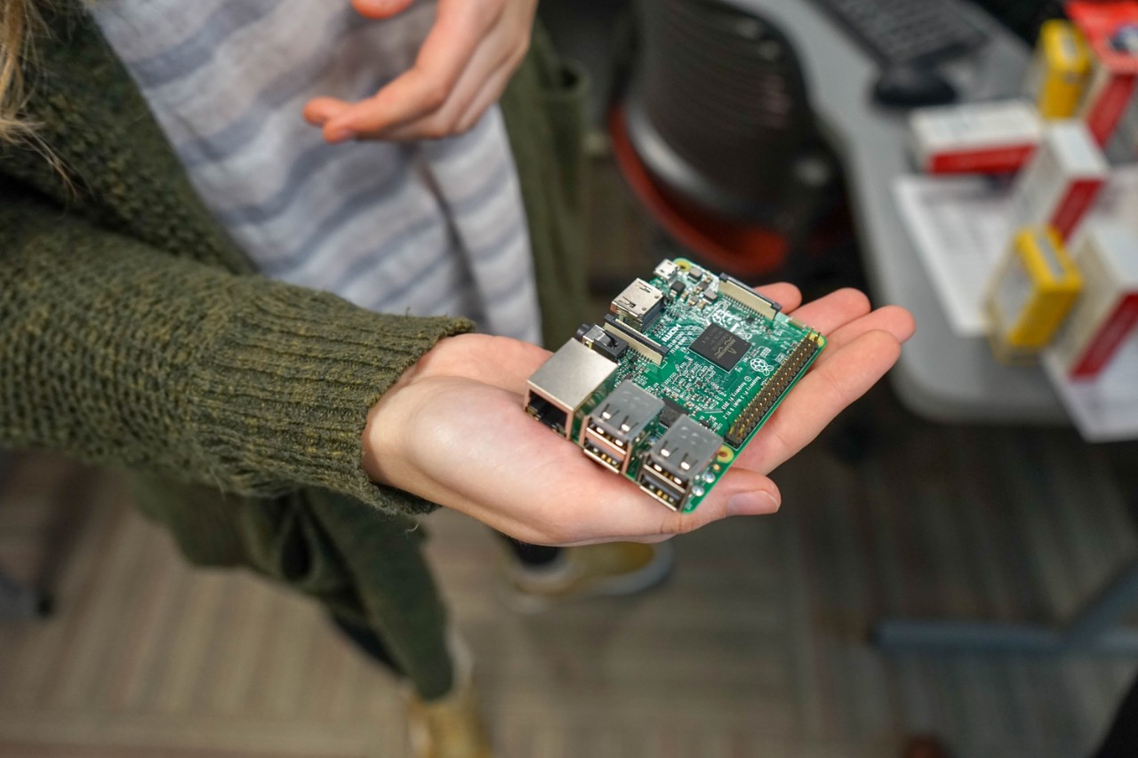 hand holding a Raspberry Pi kit