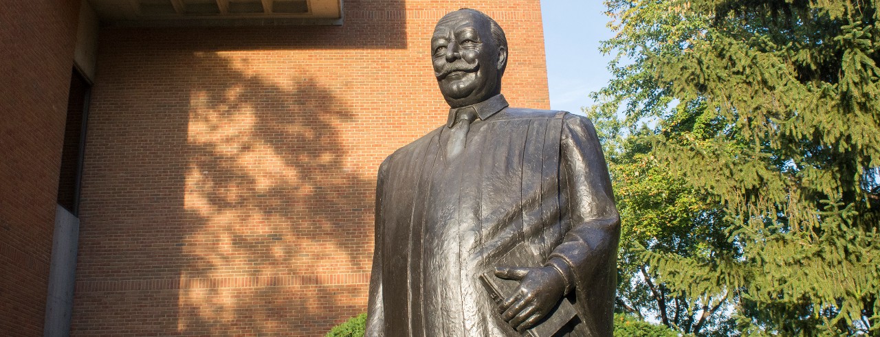 A statue outside the college of law.