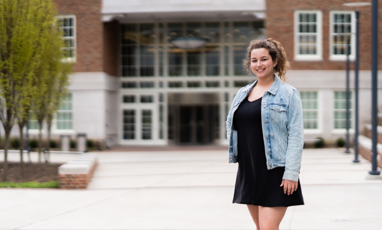 Sydney King stands on campus last spring