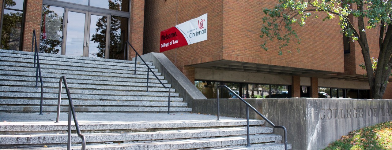 Concrete stairs in front of a brick building