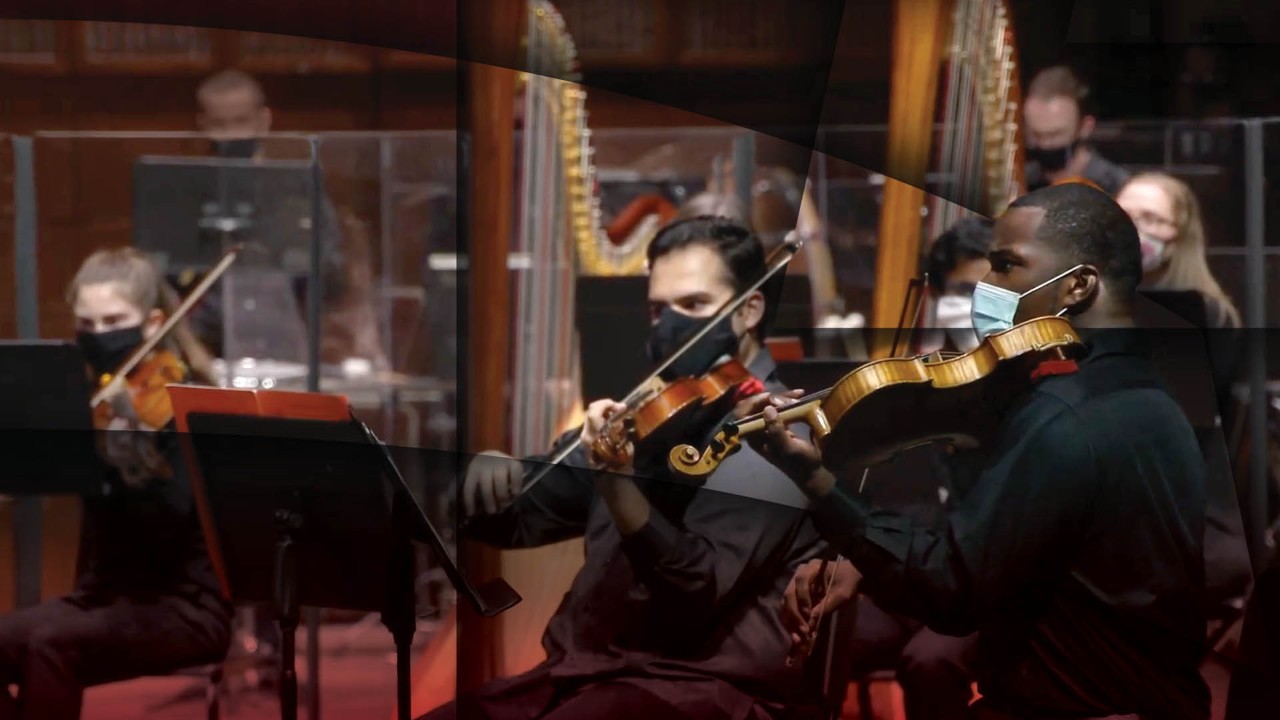 The CCM Philharmonia student orchestra performs on the stage of Corbett Auditorium.