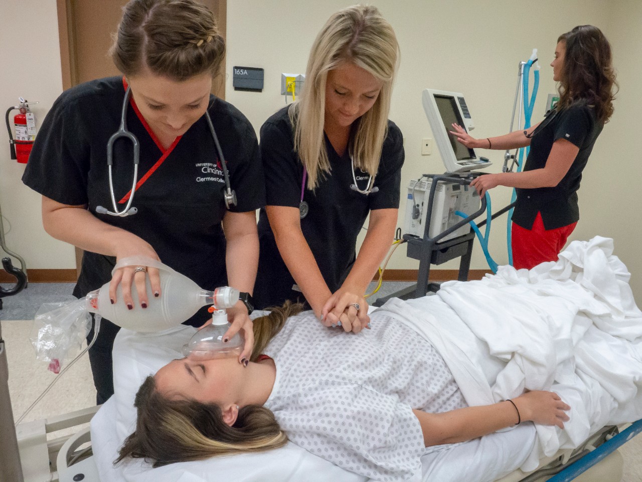 UC Clermont respiratory care students practice clinical work in a pre-COVID lab.  