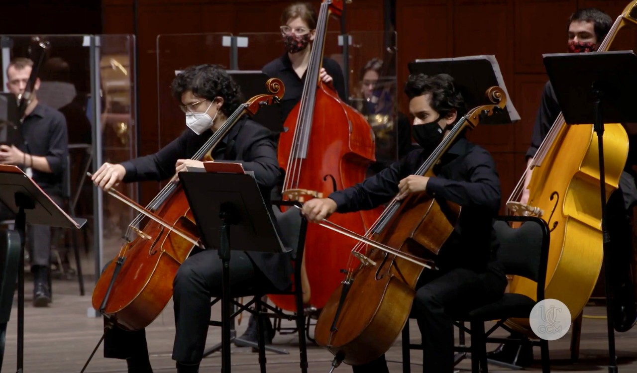 The CCM Philharmonia student orchestra performs on the stage of Corbett Auditorium.