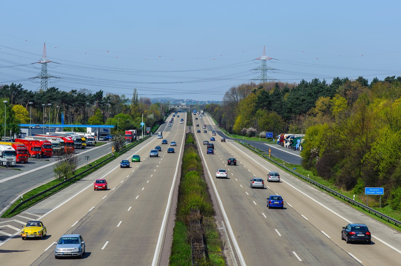 wide angle of cars in traffic on a highway