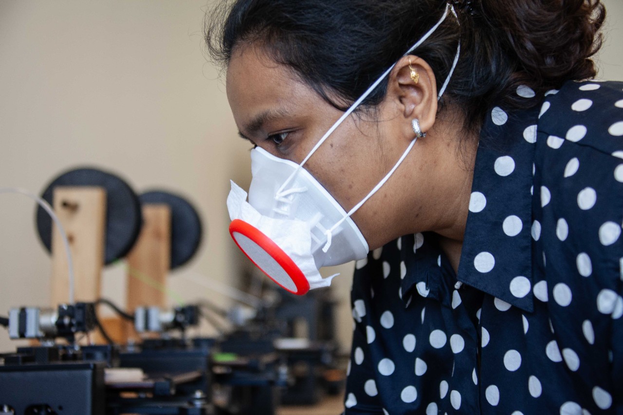 UC student Shriya Patil wears a custom 3D-printed face mask she designed.