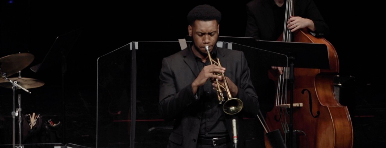 A student trumpeter performs during Moveable Feast