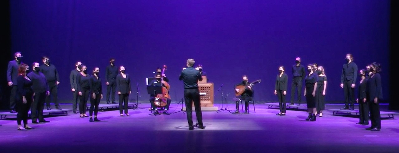 A photo of the CCM Chamber Choir performing under the direction of Joe Miller in a still image from the third installment of CCMONSTAGE Online. Photo/MasseyGreenAVP