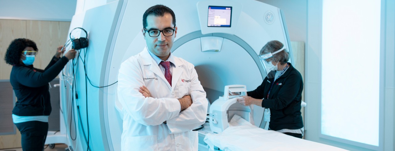 Abdelkader Mahammedi, MD, with CT machine