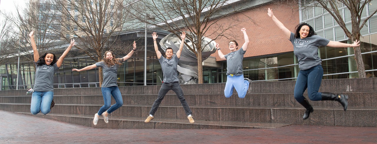 Fourth-year medical students shown outside the College of Medicine: Sarah Smith, Elizabeth Hellmann, Sven Wang, Thomas Daley and Hagar Elgendy.