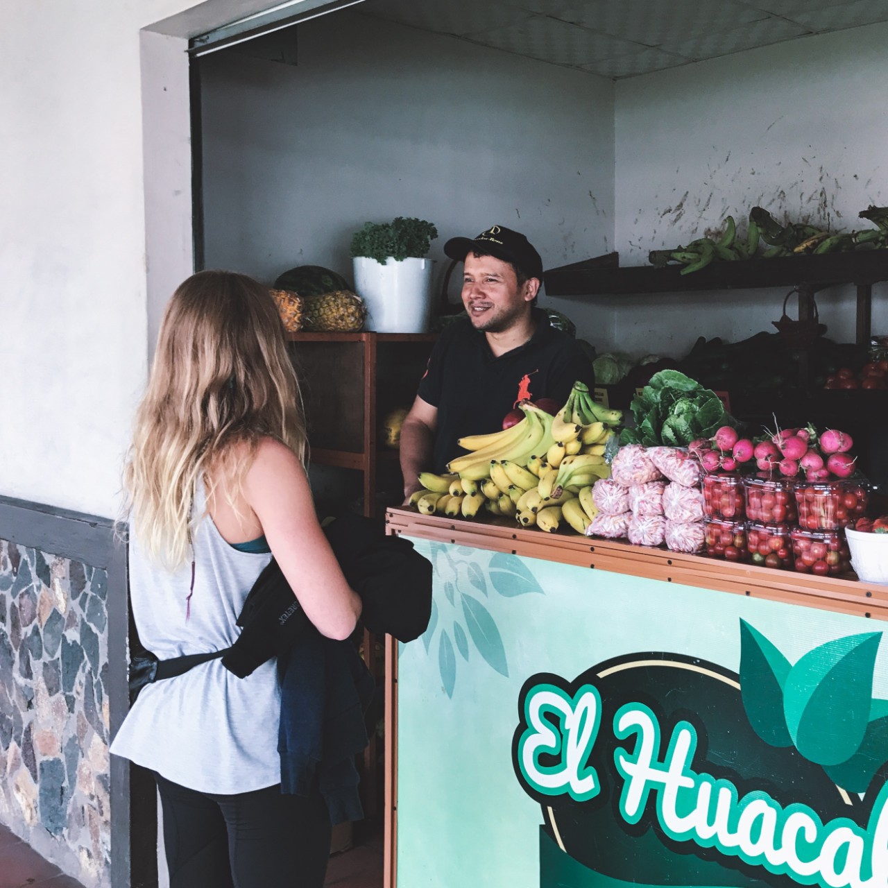 Woman visits a bodega.