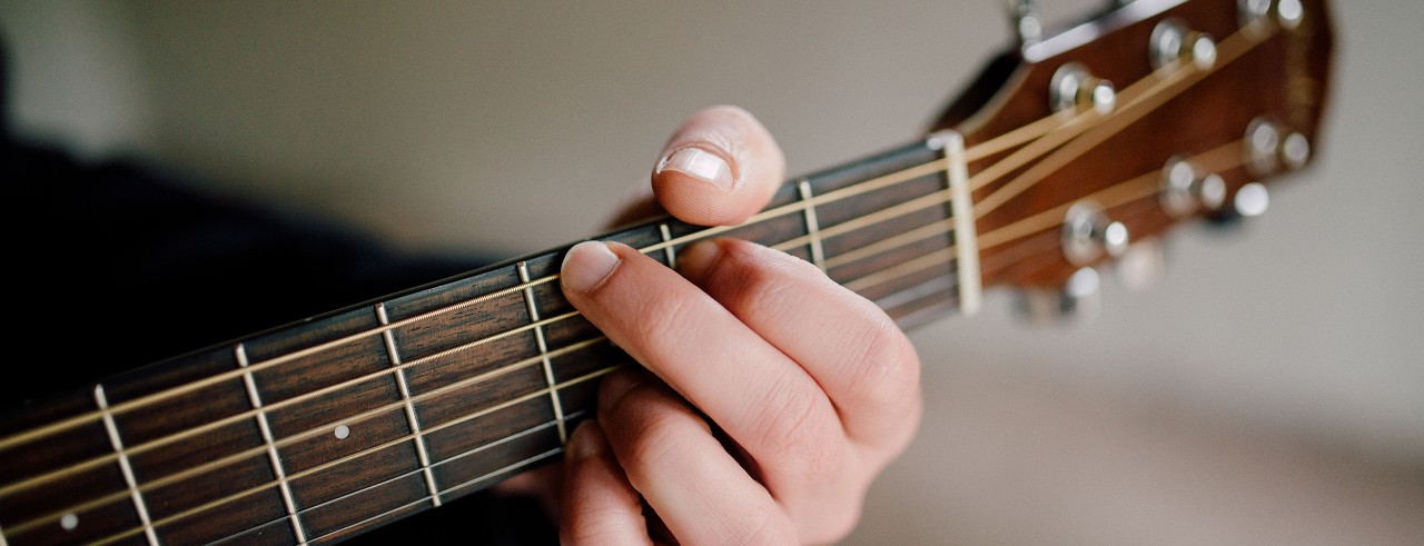 A close up of a guitar chord.
