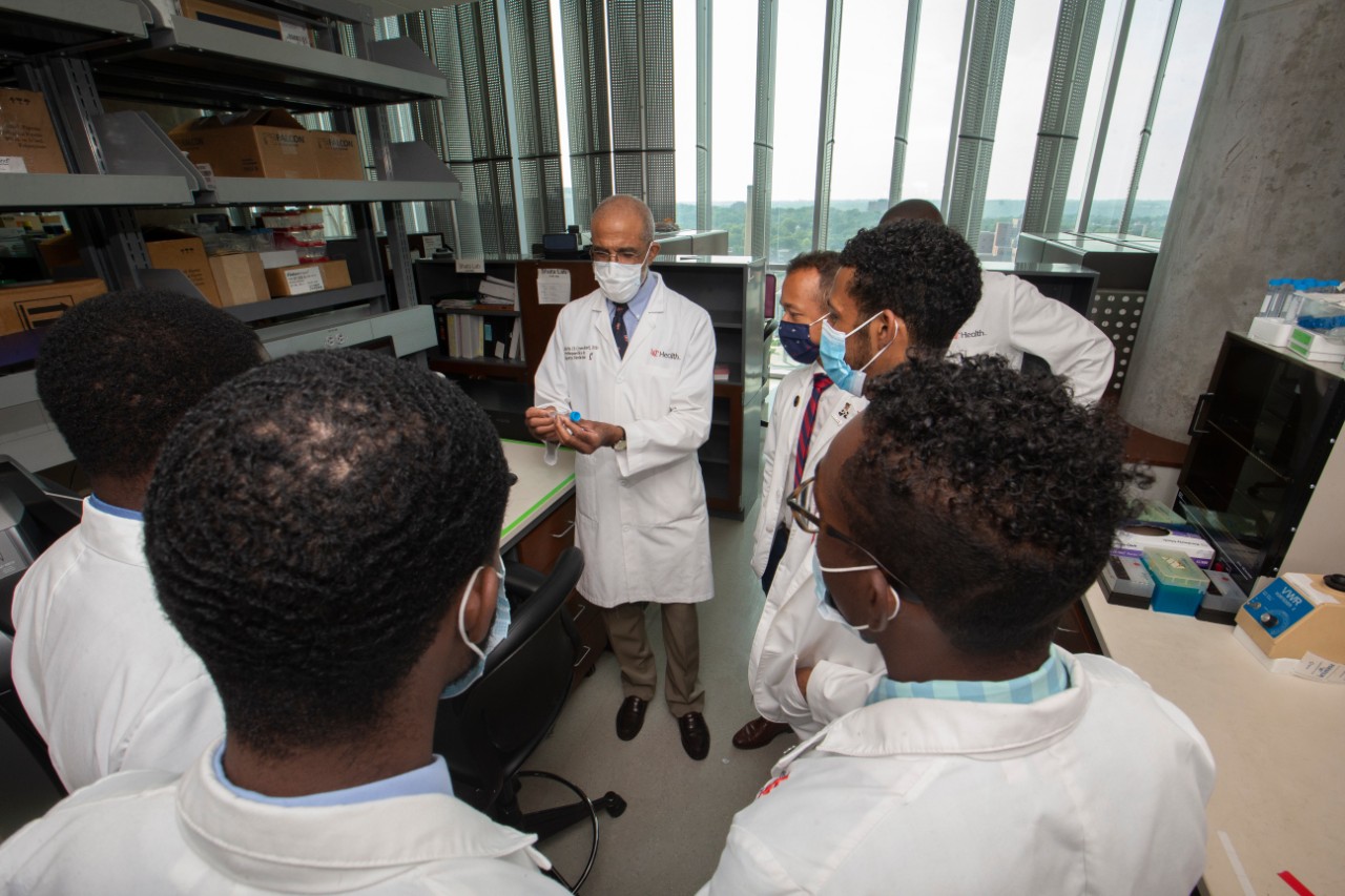 Alvin Crawford, MD, speaks with a group of medical students at the University of Cincinnati. 